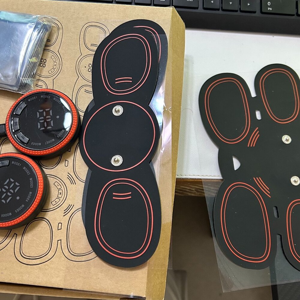 Abs and arm muscle toner/stimulator